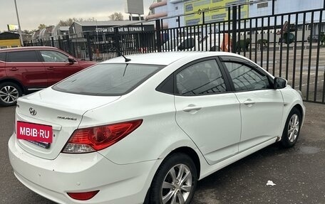 Hyundai Solaris II рестайлинг, 2011 год, 870 000 рублей, 17 фотография