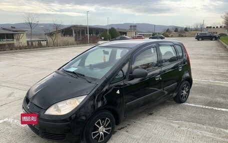 Mitsubishi Colt VI рестайлинг, 2005 год, 16 фотография