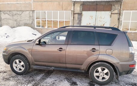 Mitsubishi Outlander III рестайлинг 3, 2011 год, 1 400 000 рублей, 10 фотография