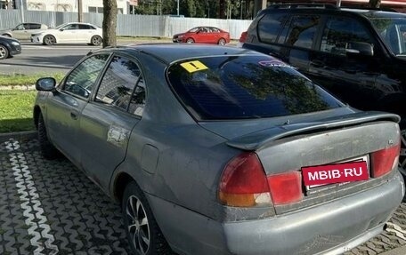 Mitsubishi Carisma I, 1997 год, 90 000 рублей, 6 фотография