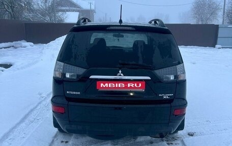 Mitsubishi Outlander III рестайлинг 3, 2010 год, 1 190 000 рублей, 10 фотография