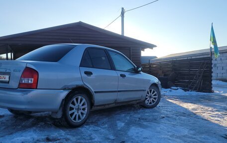 Mazda 323, 2000 год, 210 000 рублей, 3 фотография