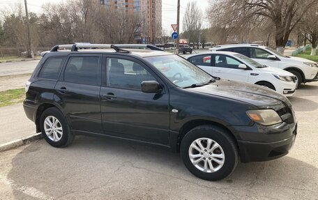 Mitsubishi Outlander III рестайлинг 3, 2003 год, 585 000 рублей, 1 фотография