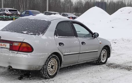 Mazda 323, 1997 год, 240 000 рублей, 3 фотография