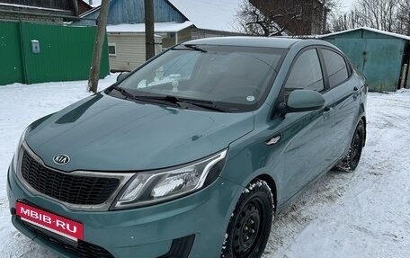 KIA Rio III рестайлинг, 2011 год, 850 000 рублей, 2 фотография