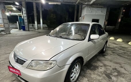 Mazda Protege, 2001 год, 240 000 рублей, 13 фотография