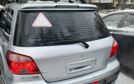 Mitsubishi Outlander III рестайлинг 3, 2007 год, 700 000 рублей, 4 фотография