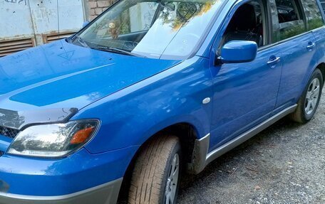 Mitsubishi Outlander III рестайлинг 3, 2003 год, 640 000 рублей, 14 фотография