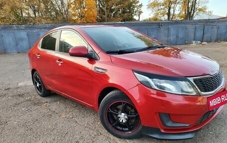 KIA Rio III рестайлинг, 2012 год, 750 000 рублей, 3 фотография