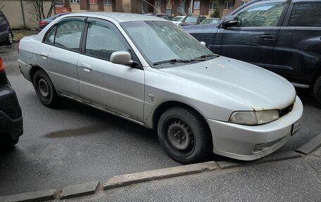 Mitsubishi Mirage VI рестайлинг, 2000 год, 150 000 рублей, 6 фотография