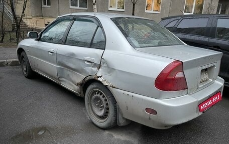 Mitsubishi Mirage VI рестайлинг, 2000 год, 150 000 рублей, 7 фотография