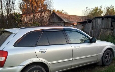 Mazda Familia Y11, 1999 год, 200 000 рублей, 3 фотография