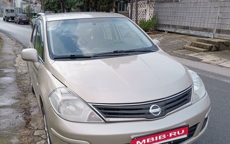 Nissan Tiida, 2013 год, 900 000 рублей, 14 фотография