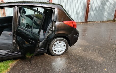 Nissan Tiida, 2011 год, 780 000 рублей, 28 фотография