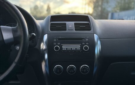 Suzuki SX4 II рестайлинг, 2009 год, 599 000 рублей, 17 фотография