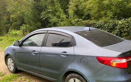 KIA Rio III рестайлинг, 2011 год, 650 000 рублей, 2 фотография