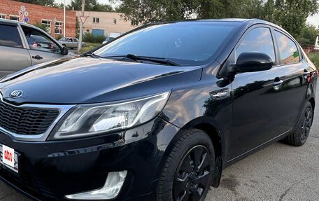 KIA Rio III рестайлинг, 2012 год, 700 000 рублей, 3 фотография