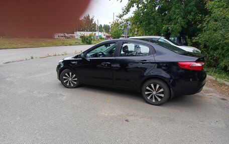 KIA Rio III рестайлинг, 2012 год, 700 000 рублей, 2 фотография