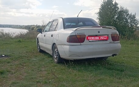 Mitsubishi Carisma I, 1997 год, 220 000 рублей, 3 фотография