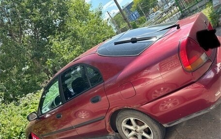 Mitsubishi Carisma I, 1997 год, 115 000 рублей, 1 фотография