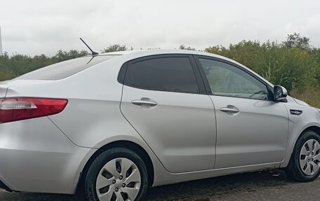 KIA Rio III рестайлинг, 2012 год, 850 000 рублей, 22 фотография