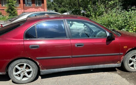 Mitsubishi Carisma I, 1997 год, 115 000 рублей, 3 фотография