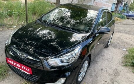 Hyundai Solaris II рестайлинг, 2011 год, 700 000 рублей, 5 фотография