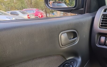 Mazda 323, 1998 год, 163 000 рублей, 13 фотография