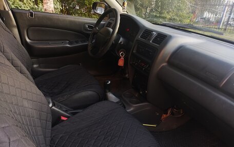 Mazda 323, 1998 год, 163 000 рублей, 9 фотография