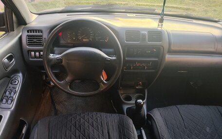 Mazda 323, 1998 год, 163 000 рублей, 10 фотография