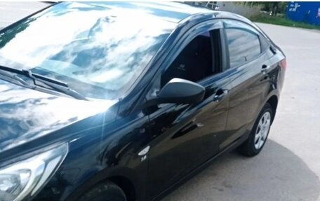 Hyundai Solaris II рестайлинг, 2011 год, 650 000 рублей, 4 фотография