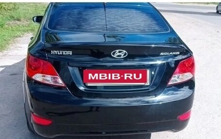 Hyundai Solaris II рестайлинг, 2011 год, 650 000 рублей, 10 фотография