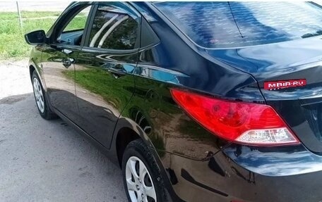 Hyundai Solaris II рестайлинг, 2011 год, 650 000 рублей, 9 фотография