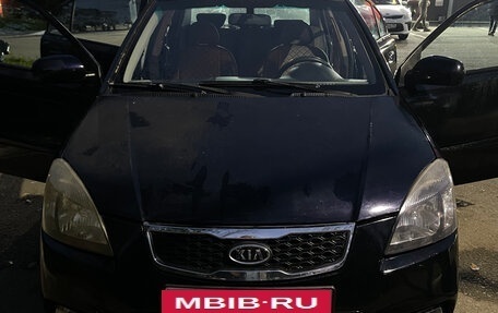 KIA Rio II, 2009 год, 11 фотография