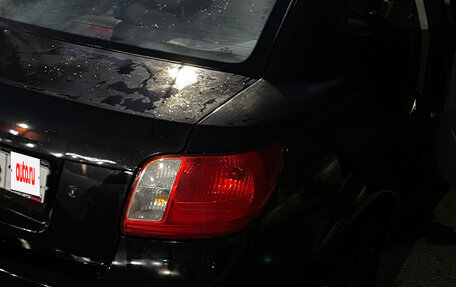 KIA Rio II, 2009 год, 15 фотография