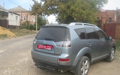Mitsubishi Outlander III рестайлинг 3, 2007 год, 990 000 рублей, 4 фотография