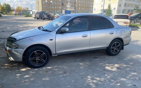 Mazda Familia, 1996 год, 128 000 рублей, 4 фотография