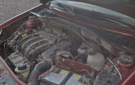 Renault Logan I, 2012 год, 550 000 рублей, 2 фотография