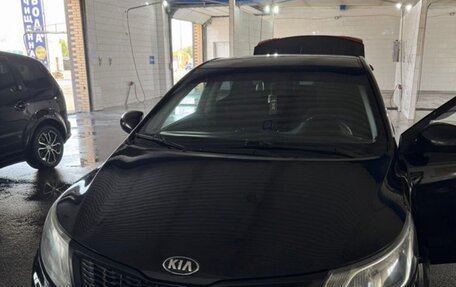 KIA Rio III рестайлинг, 2012 год, 650 000 рублей, 2 фотография
