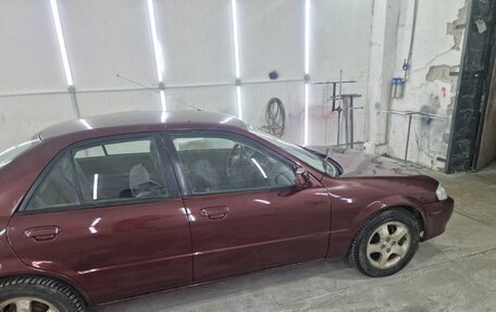 Mazda Protege, 1999 год, 350 000 рублей, 6 фотография
