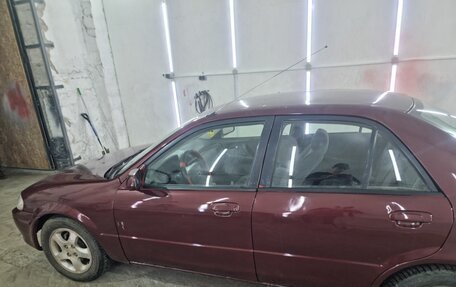 Mazda Protege, 1999 год, 350 000 рублей, 8 фотография