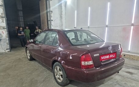Mazda Protege, 1999 год, 350 000 рублей, 9 фотография