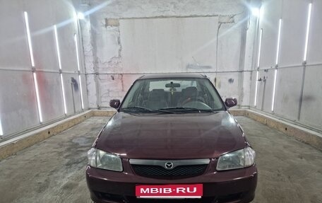 Mazda Protege, 1999 год, 350 000 рублей, 11 фотография