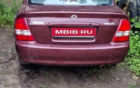 Mazda Protege, 1999 год, 350 000 рублей, 16 фотография