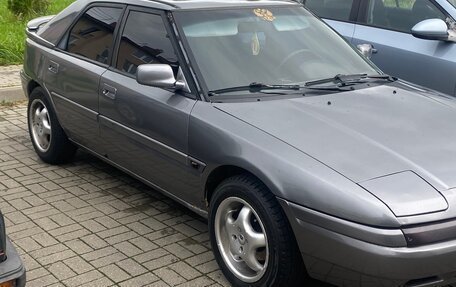 Mazda 323, 1993 год, 260 000 рублей, 7 фотография