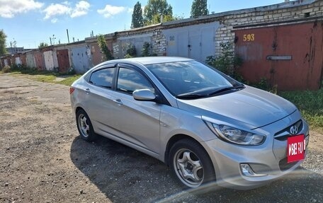 Hyundai Solaris II рестайлинг, 2011 год, 710 000 рублей, 3 фотография