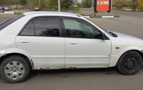Mazda Familia, 2003 год, 210 000 рублей, 8 фотография