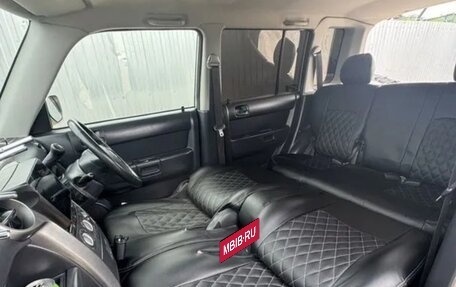 Toyota bB I рестайлинг, 2003 год, 1 000 000 рублей, 33 фотография