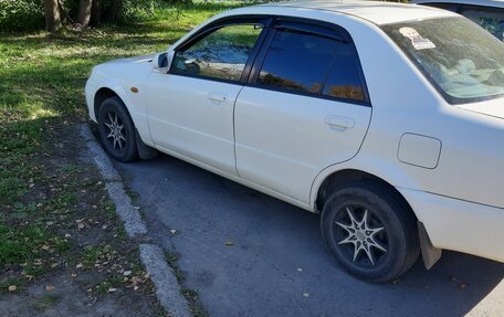 Mazda Familia, 2001 год, 350 000 рублей, 2 фотография