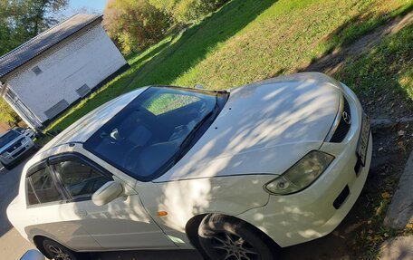 Mazda Familia, 2001 год, 350 000 рублей, 4 фотография